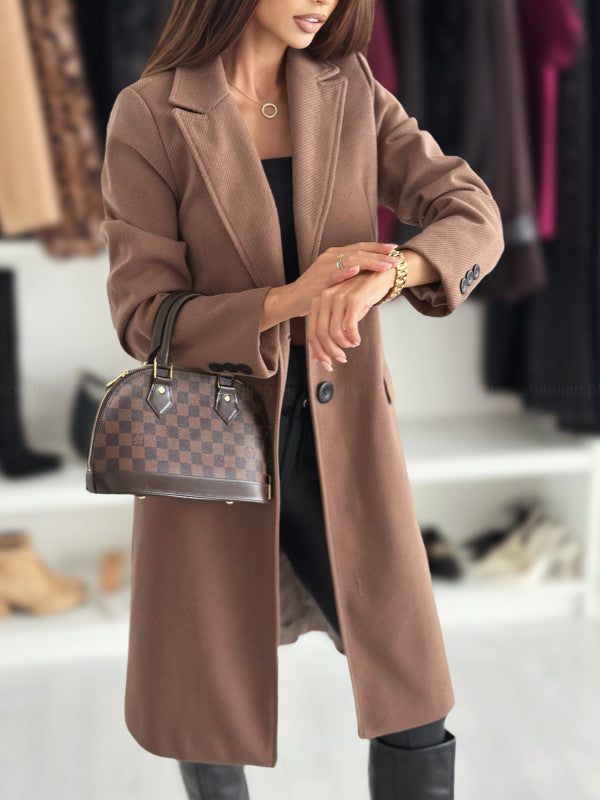 Lange elegante damesjas met knoopsluiting