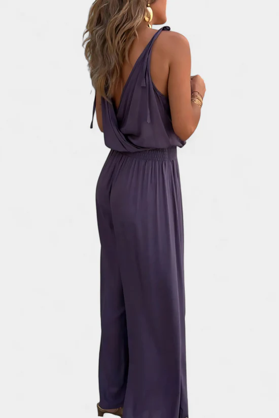 Lange elegante jumpsuit met smalle bandjes diepe halslijn en open pijpen