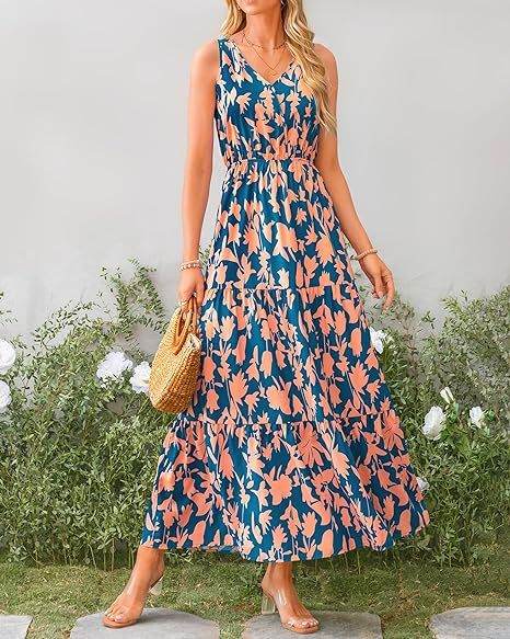 Elegante lange maxi jurk zonder mouwen met vloeiende uitstraling