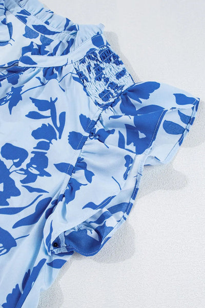 Midi jurk met bloemenprint gelaagde rok en speelse franjemouwen