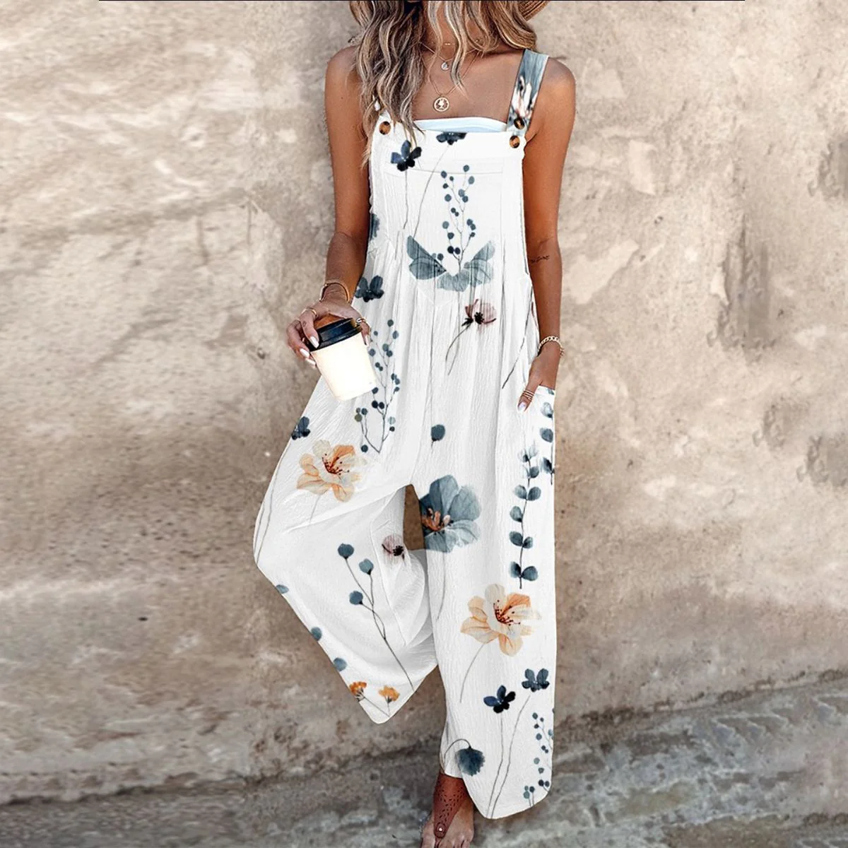 Stijlvolle lange jumpsuit met smalle bandjes wijde pijpen en print voor een moderne look