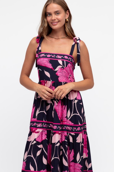 Maxi zomerjurk met bloemenprint en strikbandjes voor een stijlvolle look