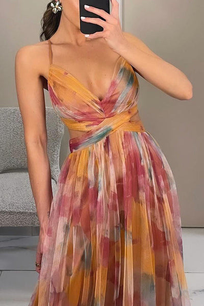 Elegante maxi jurk met dunne bandjes en artistiek bloemenmotief