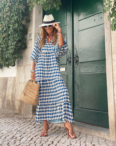 Midi jurk met pofmouwen en gelaagde rok voor een vrouwelijke look