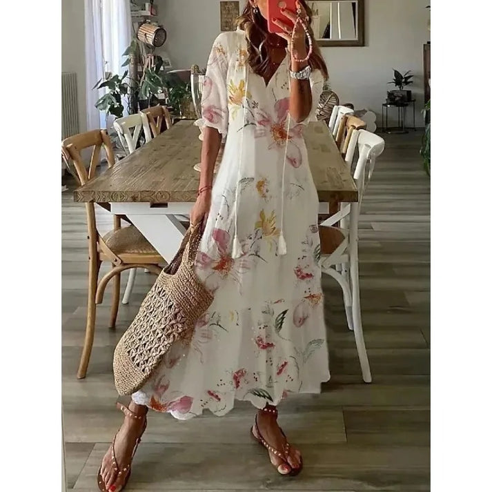 Maxi jurk met bloemenprint en korte mouwen