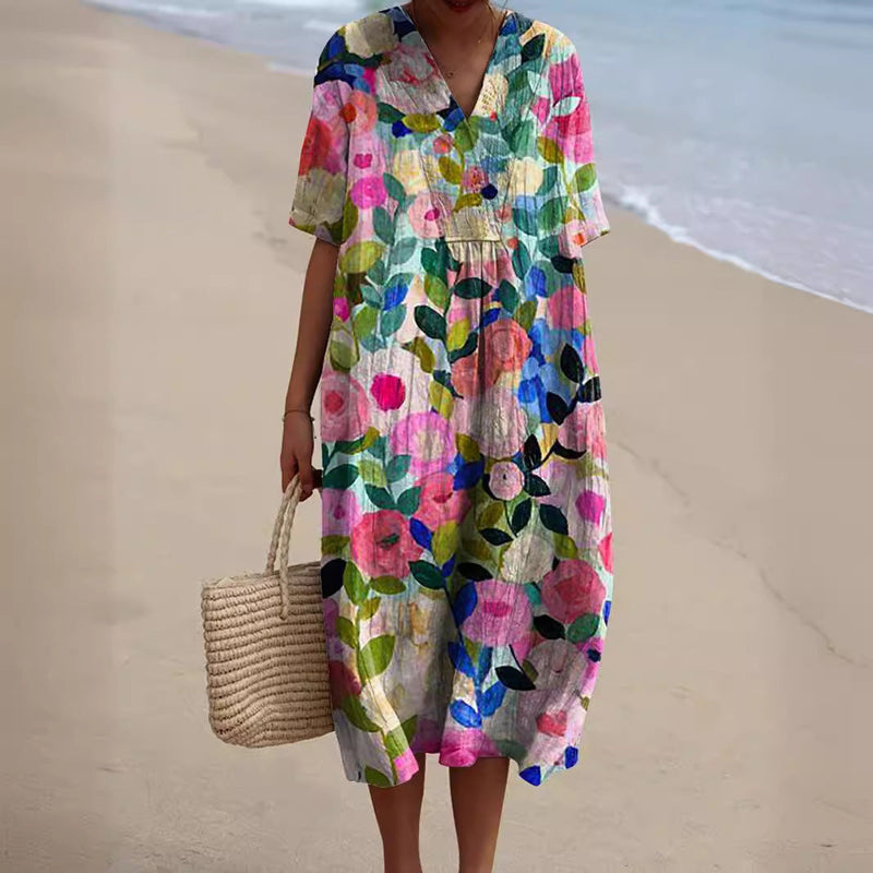 Zomerse midi jurk met bloemenprint korte mouwen en v hals