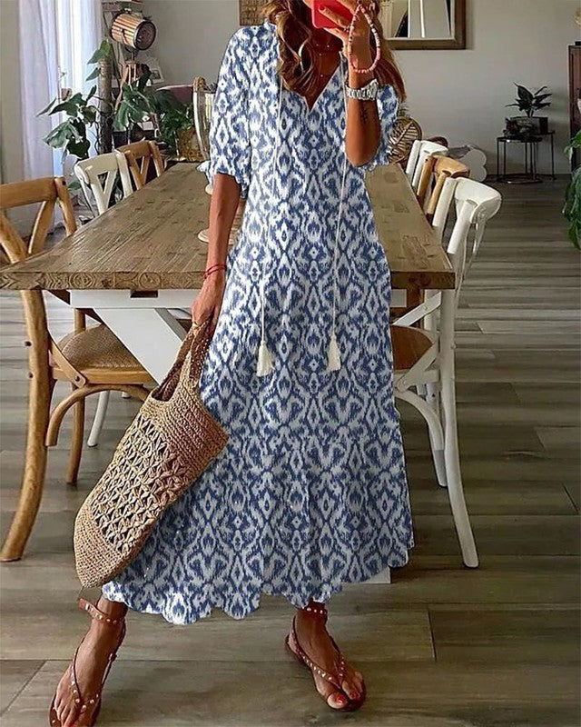 Romantische maxi jurk met korte mouwtjes en zomerse stijl