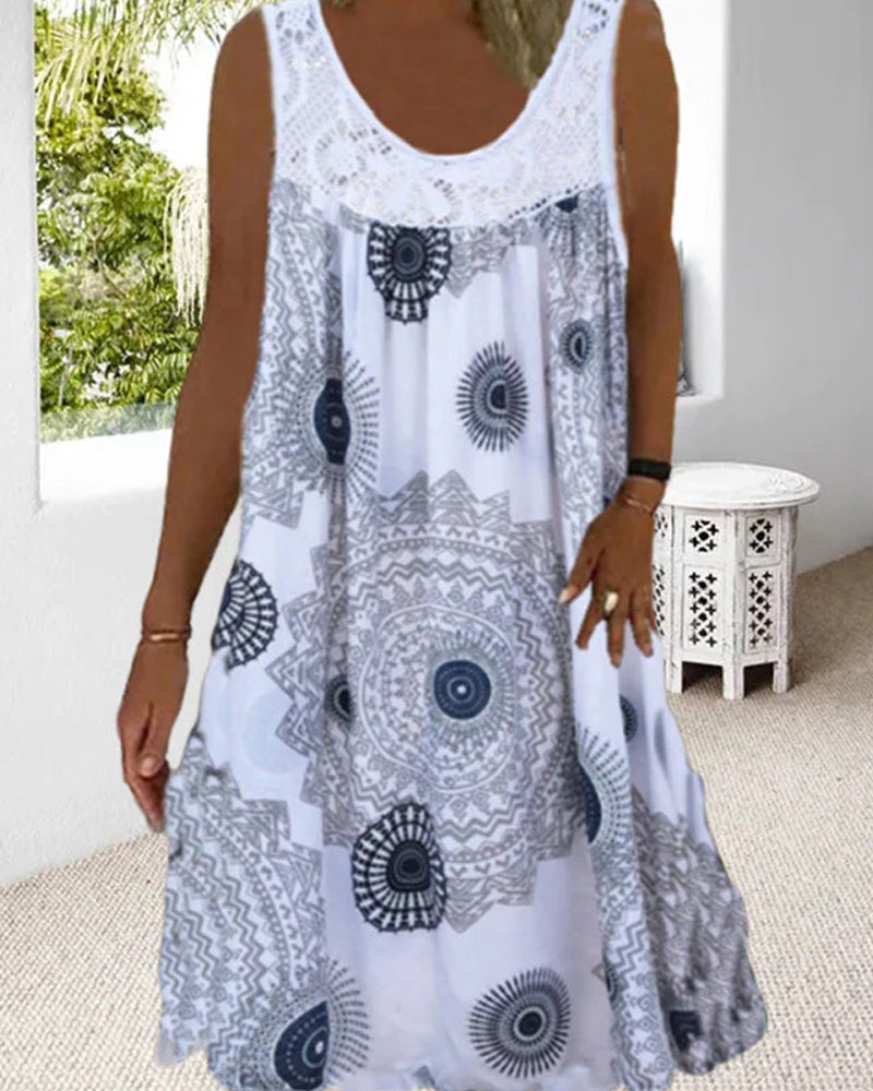 Zomerse midi jurk met ronde hals en mouwloos ontwerp met print
