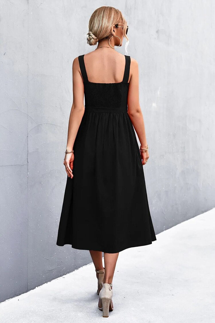 Mouwloze damesjurk met rechte halslijn en elegante midi lengte