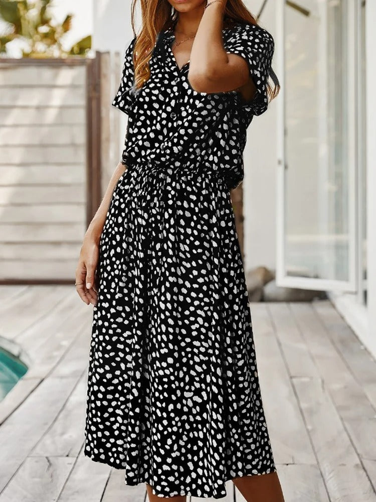 Stijlvolle dames midi jurk met korte mouwen voor zomerse dagen
