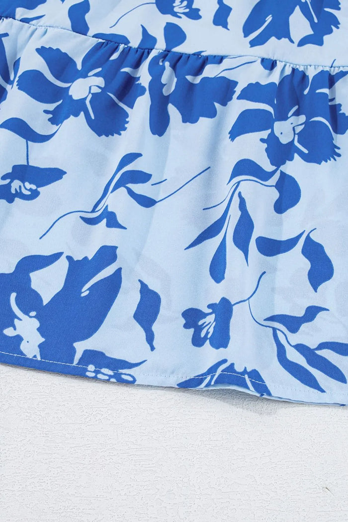 Midi jurk met bloemenprint gelaagde rok en speelse franjemouwen