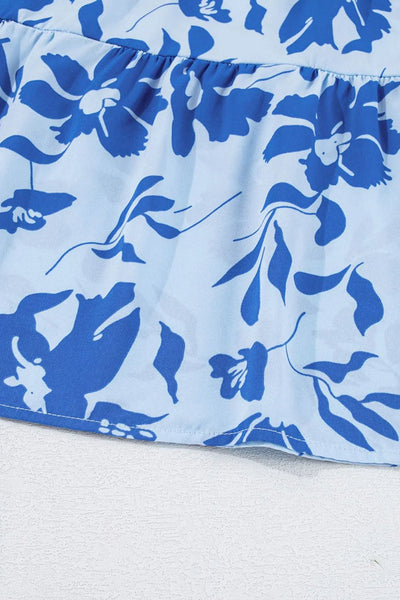 Midi jurk met bloemenprint gelaagde rok en speelse franjemouwen