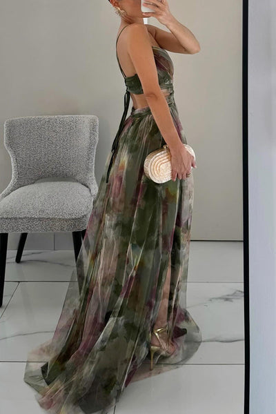 Elegante maxi jurk met dunne bandjes en artistiek bloemenmotief