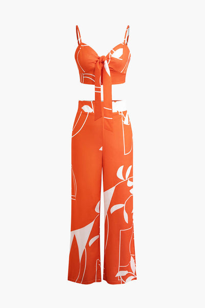 Tweedelige set met cropped top met strikbandjes en wijde broek met bamboebladerenprint