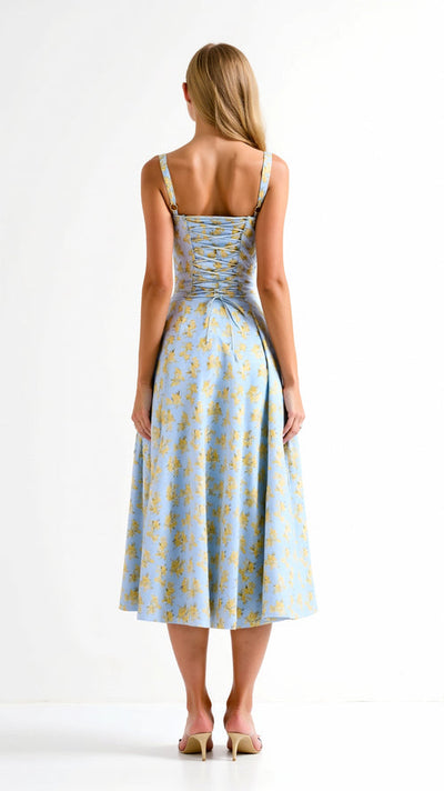 Elegante midi jurk zonder mouwen met bloemenmotief