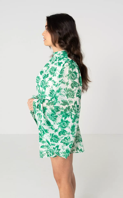 Stijlvolle korte jumpsuit met lange wijde mouwen en open rug