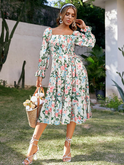 Lange damesjurk met vierkante hals bloemenprint en boho stijl met wijde mouwen