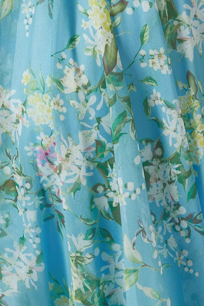 Lange damesjurk met bloemenprint plooidetail en sierlijke bandjes