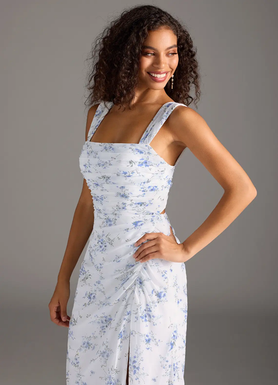 Elegante maxi jurk met vierkante halslijn en bladerenprint