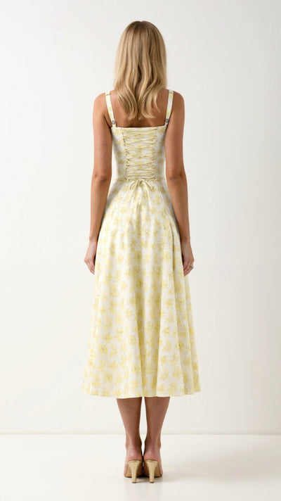 Elegante midi jurk zonder mouwen met bloemenmotief