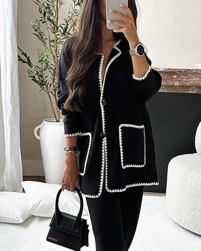Brenda - Tweedelige set van casual broek en gebreide top versierd met effen gekleurde lijn