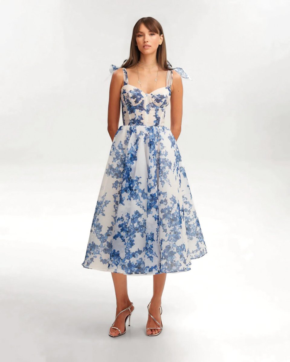 Zomerse midi jurk met bloemenprint en fijne bandjes