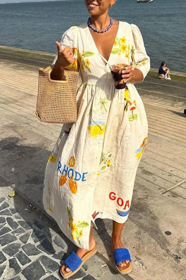 Zomerse midi jurk met stijlvolle strandprint