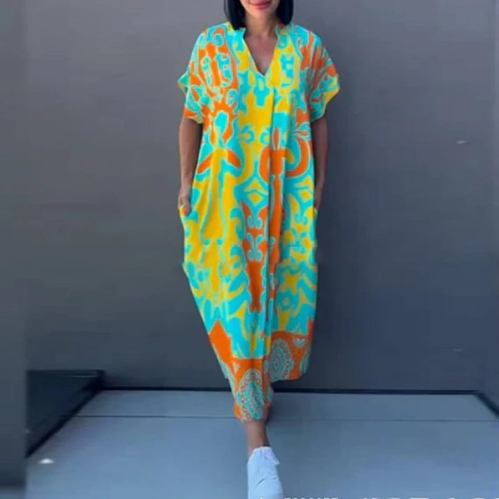 Luchtige maxi zomerjurk met losvallend model en speels patroon voor dames