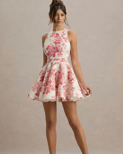 Elegante korte jurk met open rug en strikdetail achteraan