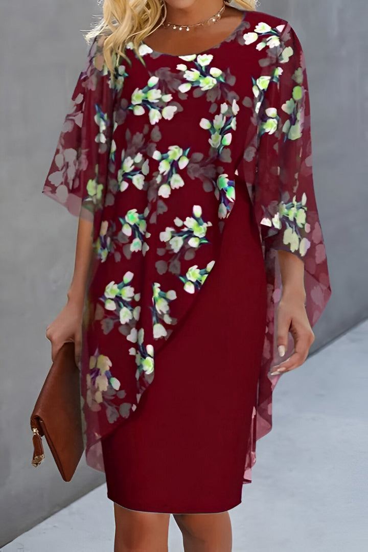 Elegante damesjurk met bloemenprint en verfijnd ontwerp voor speciale gelegenheden