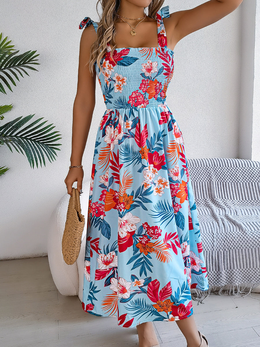Zomerse lange jurk met bloemenprint en smalle bandjes voor een elegante look