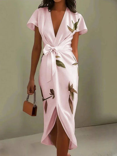 Elegante midi overslagjurk met bladprint v hals en korte mouwen