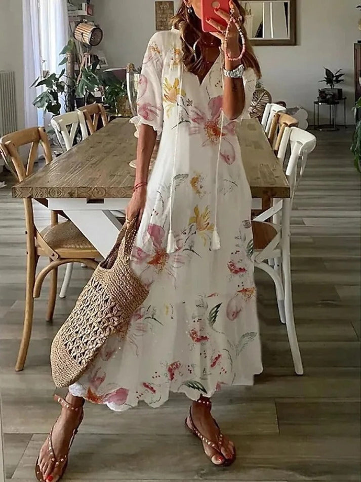 Zomerse maxi jurk met boho print en elegante v-hals