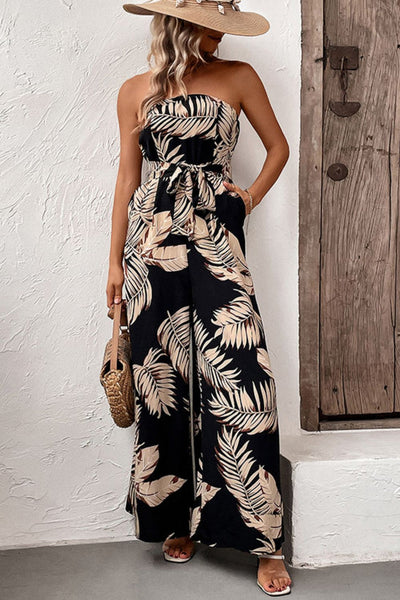 Straploze dames jumpsuit met bladprint en wijde pijpen voor een zomerse look