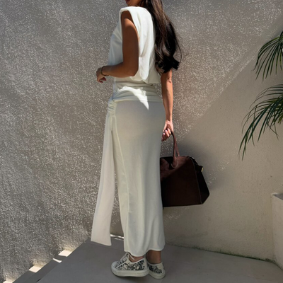 Tweedelig dames set met mouwloze top en lange rok met split