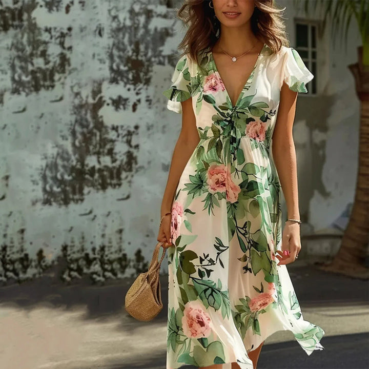 Elegante damesjurk op midi lengte met bloemenprint