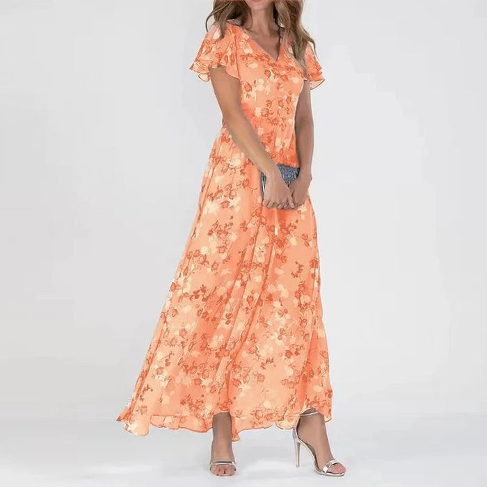 Lange zomerse maxi jurk met V hals en korte sierlijke mouwen