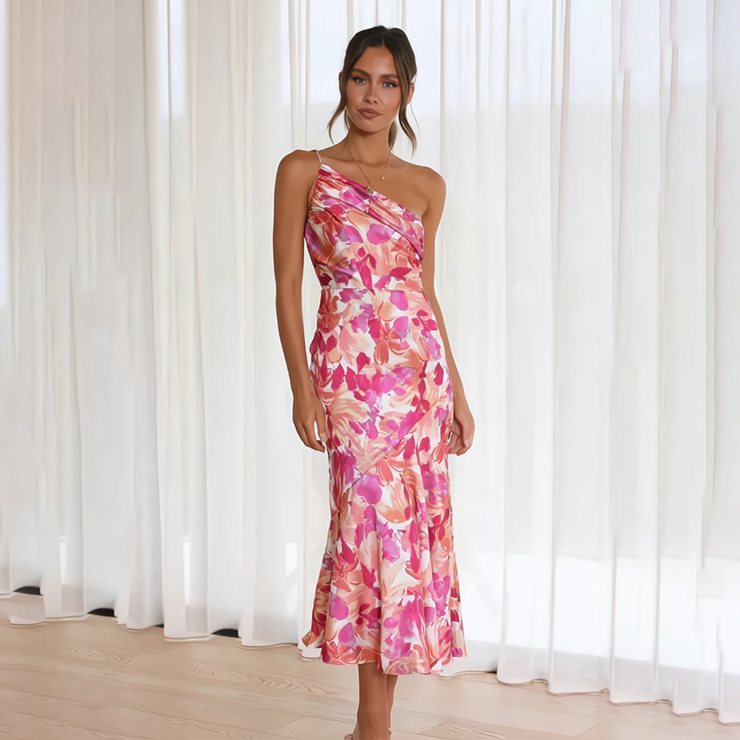 Zomerse midi jurk met bloemenmotief en asymmetrische schouderband