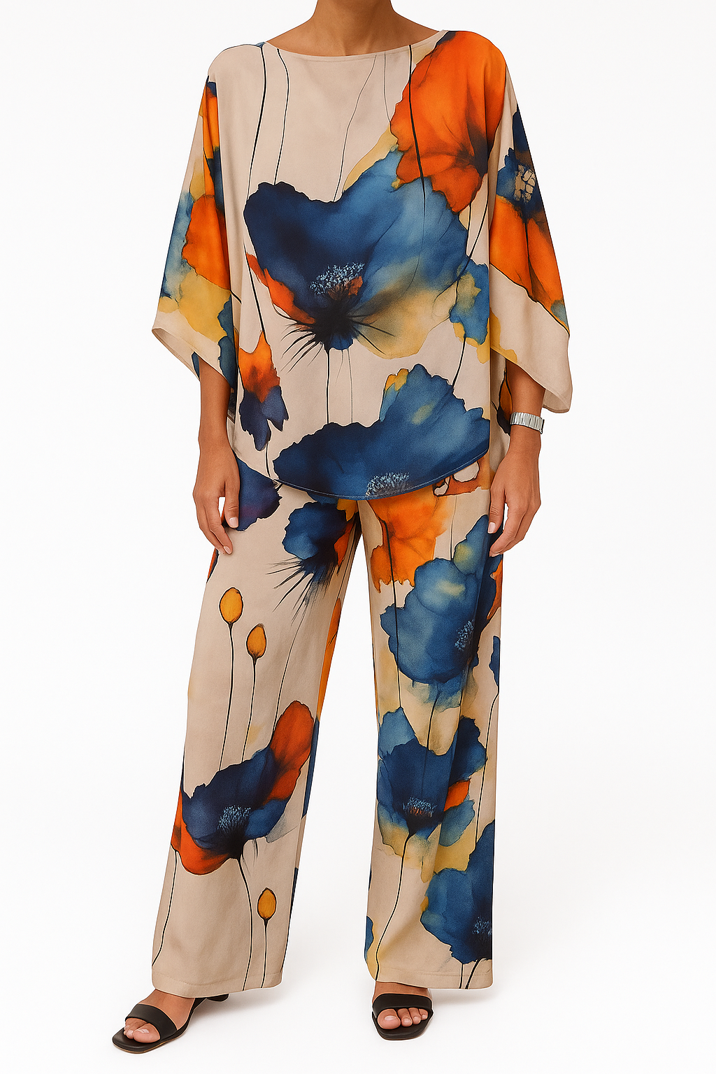 Elegante dames set met wijde blouse en bijpassende broek voor een stijlvolle uitstraling