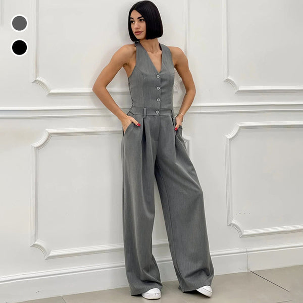 Mouwloze dames jumpsuit met halternek wijde pijpen en knopen aan de voorkant