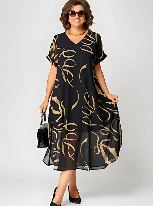Elegante zomerse midi jurk met korte mouwen en luchtige uitstraling