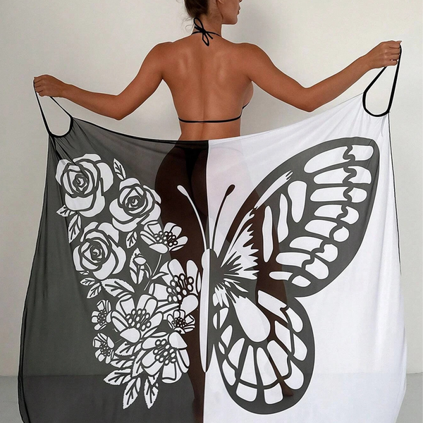 Luchtige strandpareo met vlindermouwen als zomerse cover-up