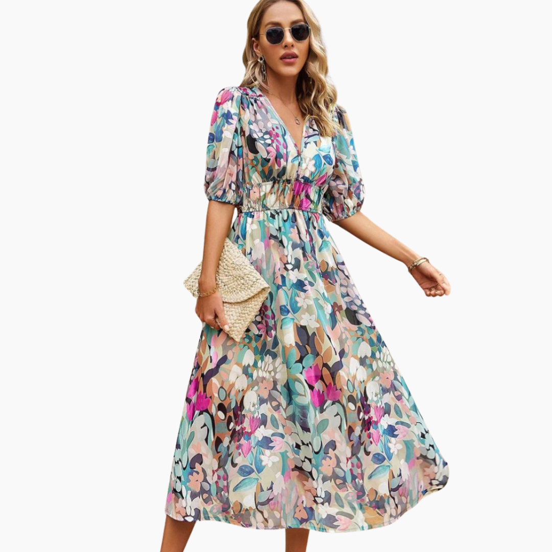 Elegante midi jurk met bloemenmotief en pofmouwen