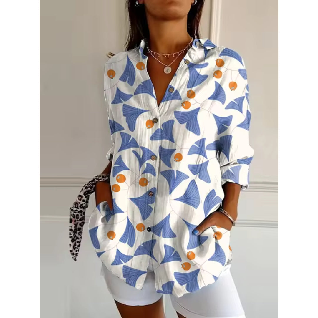 Vrouwelijke bloemenblouse met stijlvolle knopen
