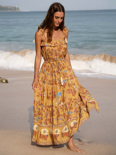 Lange strandjurk met bandjes en luchtige elegante uitstraling