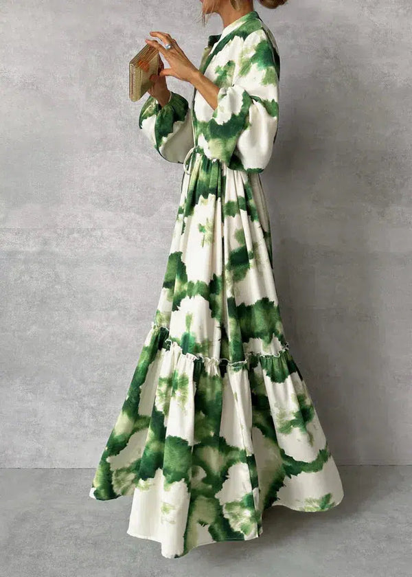 Lange damesjurk met lange mouwen V-hals en elegante vloeiende stijl