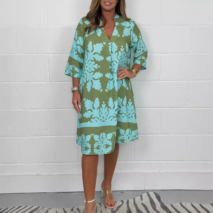 Elegante korte damesjurk met wijde pasvorm en print