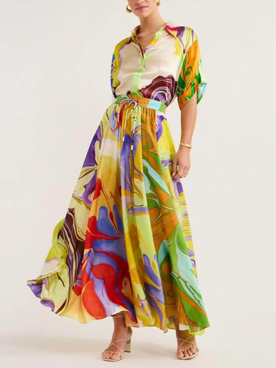 Tweedelig dames set met zomerse print bestaande uit blouse en maxi rok