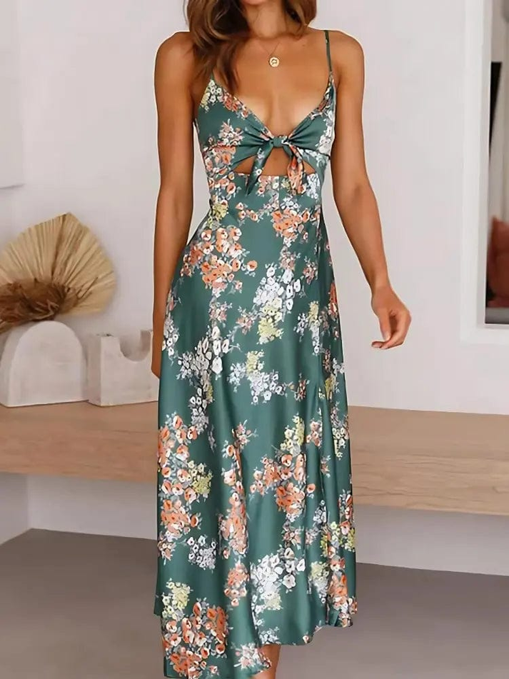 Lange damesjurk met bloemenmotief en fijne bandjes voor warme dagen