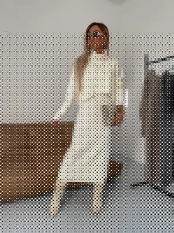 Stijlvolle set met een elegante jurk en coltrui